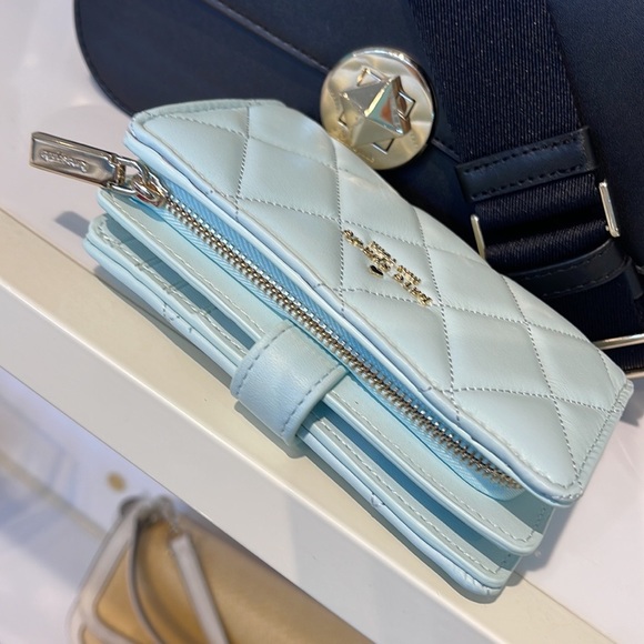 Kate Spade Carey Medium Compartment Bifold Wallet
COLOR: Turquoise - Picture 12 of 16